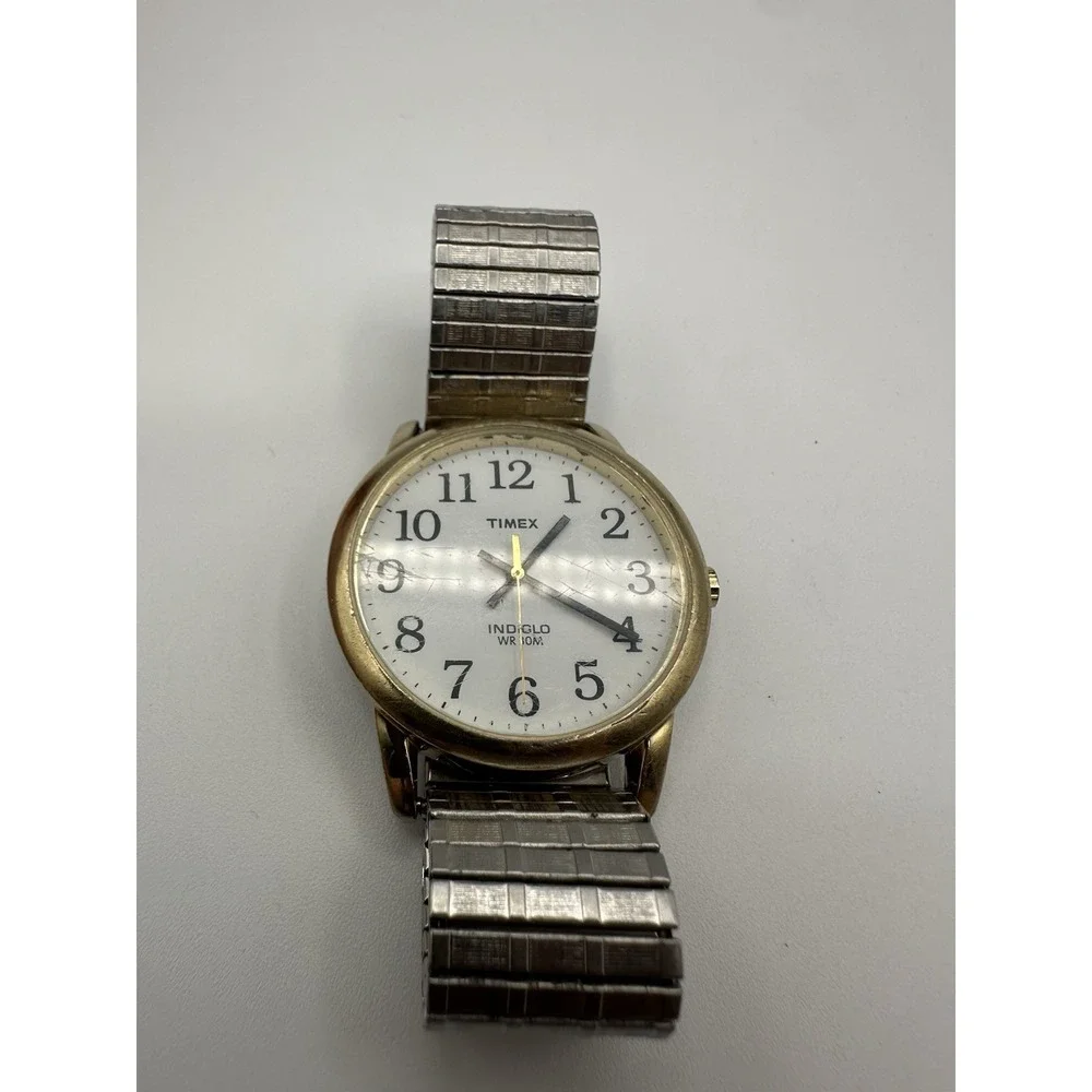 Timex Indiglo Men's Gold Tone Day Date Quartz Wristwatch WR 30M Stretch Band